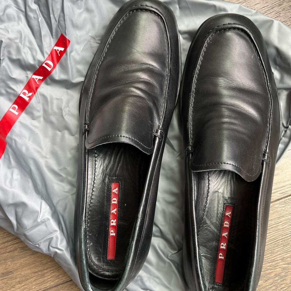 Men’s Prada leather loafer slip ons
